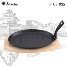 Non-stick oval cast iron sizzler plate